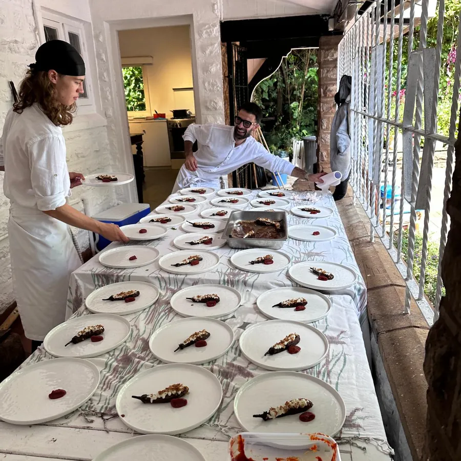 Chef Antonio preparing plates