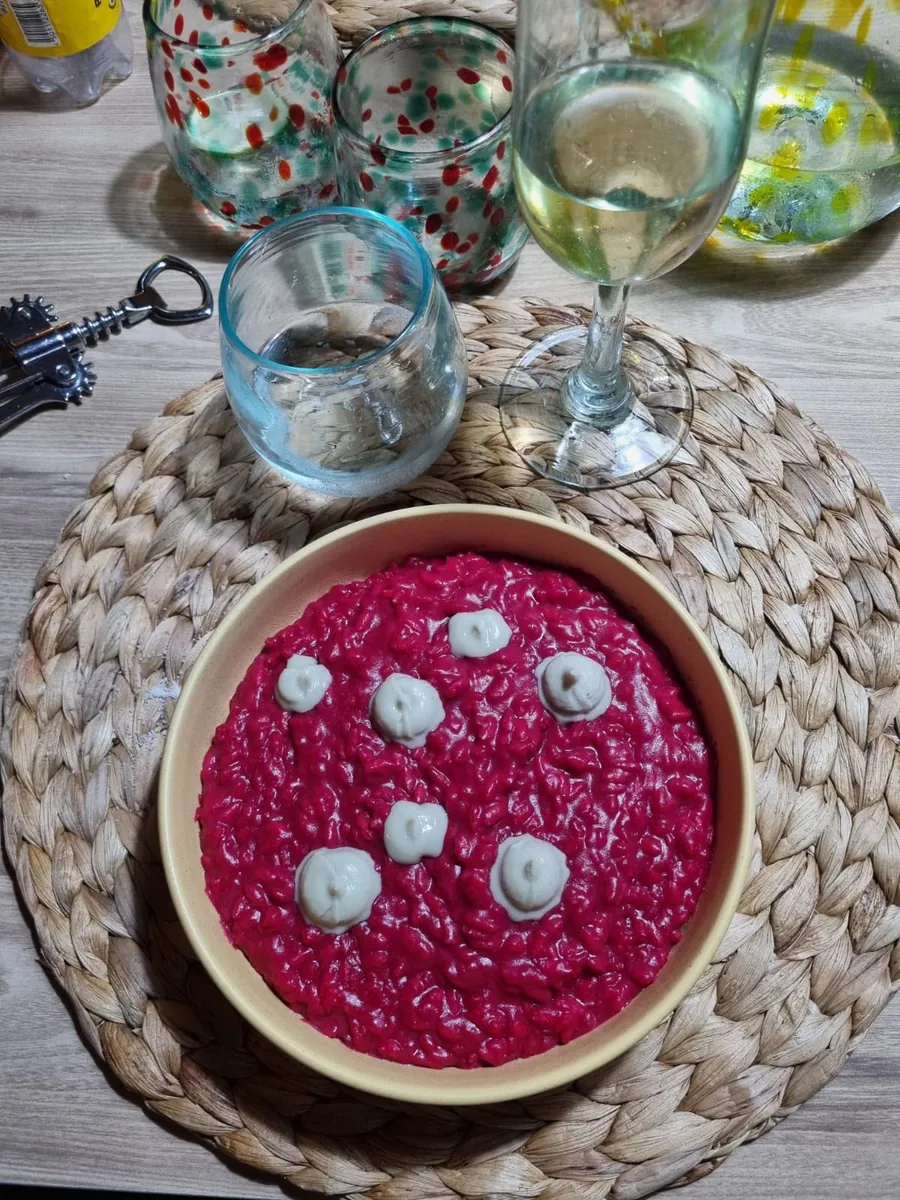 Beetroot risotto in a ceramic bowl